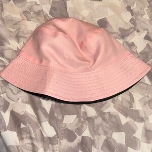 reversible pink and black bucket hat